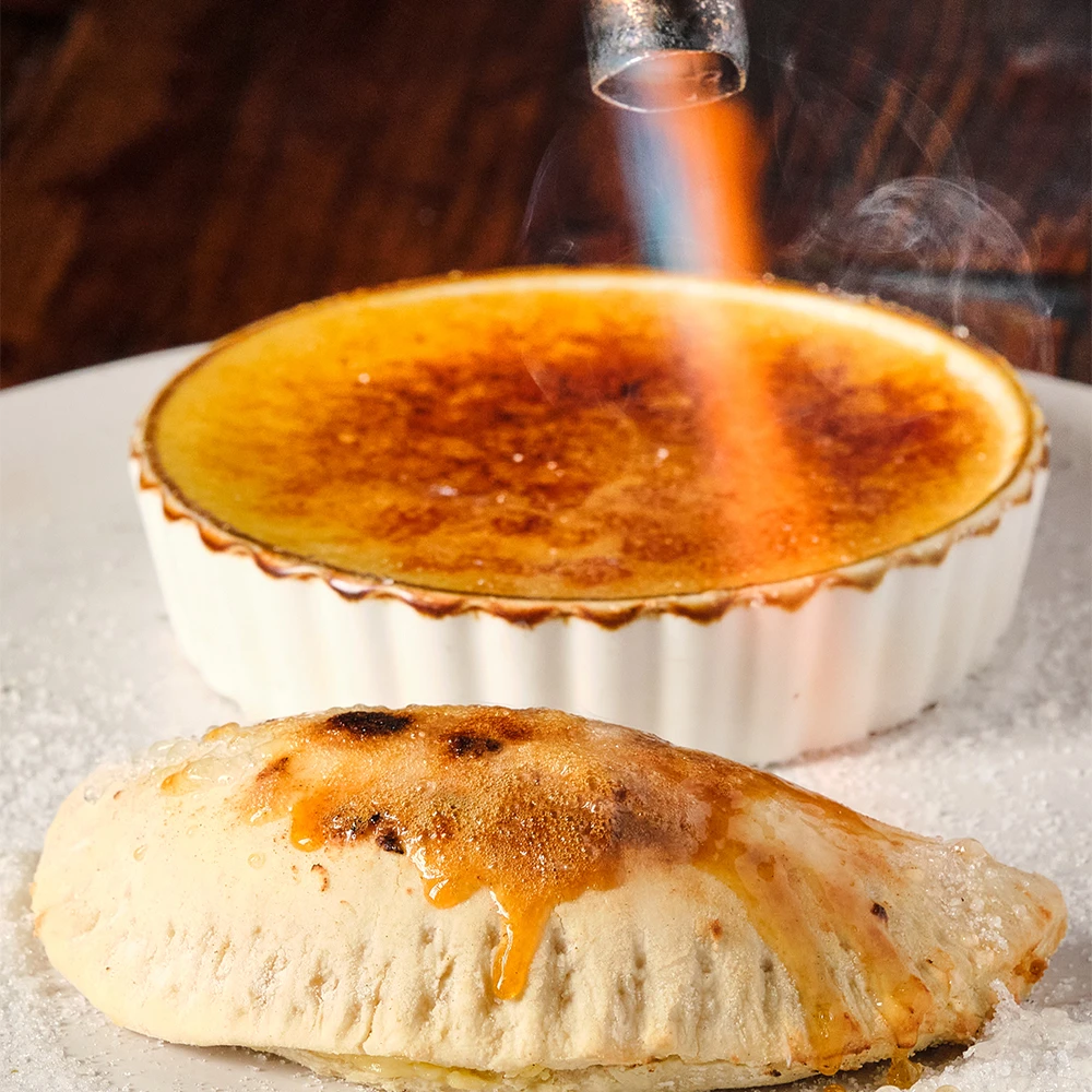 Crème brûlée dessert empanada, caramelized on top