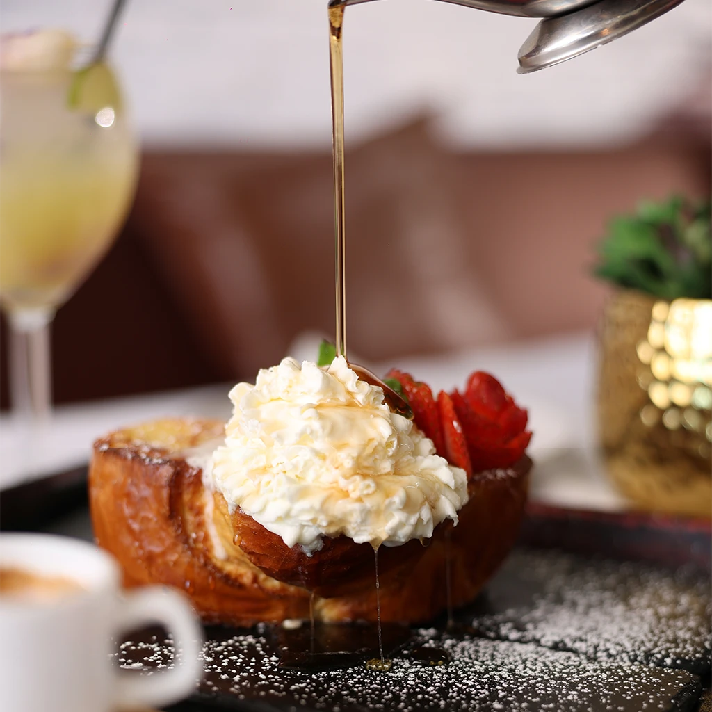 Sugar Loaf: thick-cut French toast with whipped cream, fresh strawberries and syrup poured over the top