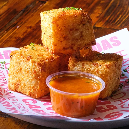 Tapioca cheesy dice, naturally gluten-free, crisp outside and stretchy inside